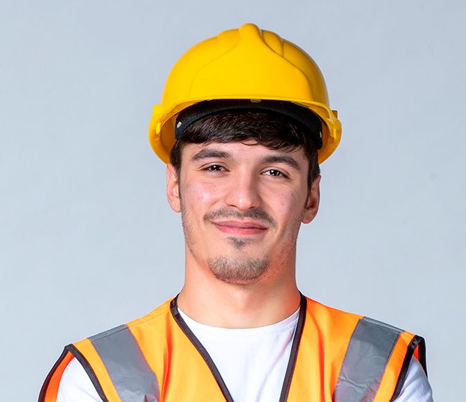 front-view-male-builder-uniform-yellow-helmet-white-wall front-view-male-builder-uniform-yellow-helmet-white-wall